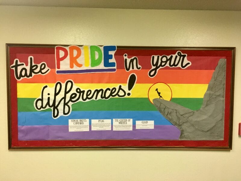 'Take Pride in Our Differences' rainbow classroom display