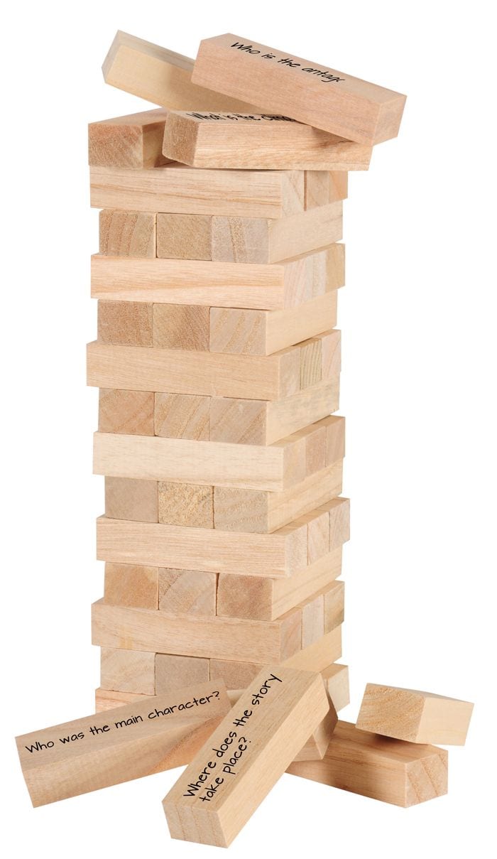 Jenga game with reading comprehension questions written on blocks