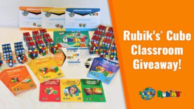 Rubik's Cube prize pack with Rubik's Cube Classroom Giveaway on orange background
