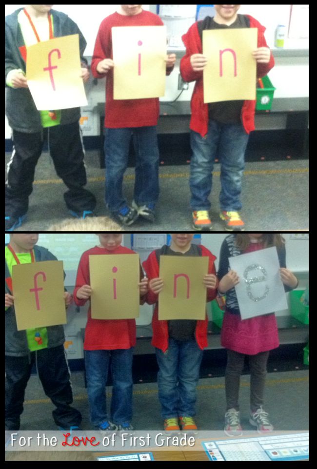 Students lined up to spell FIN, then with a student added at the end with a sparkly E to spell FINE