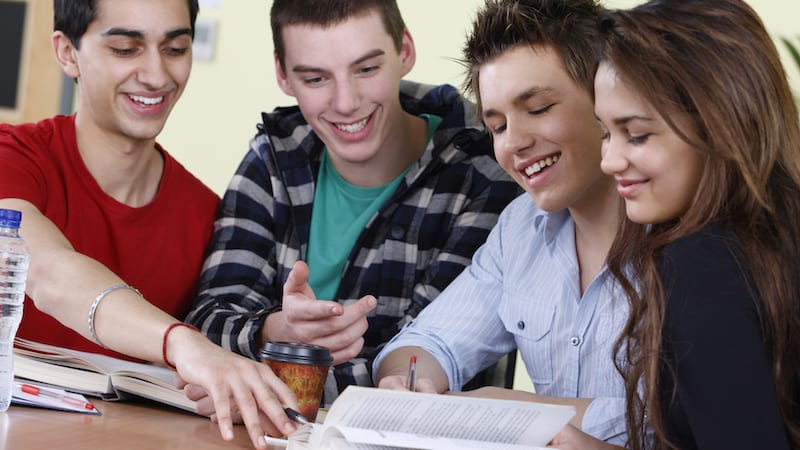 young students revising in a university classroom