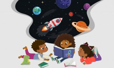 Cartoon kids reading a book in space