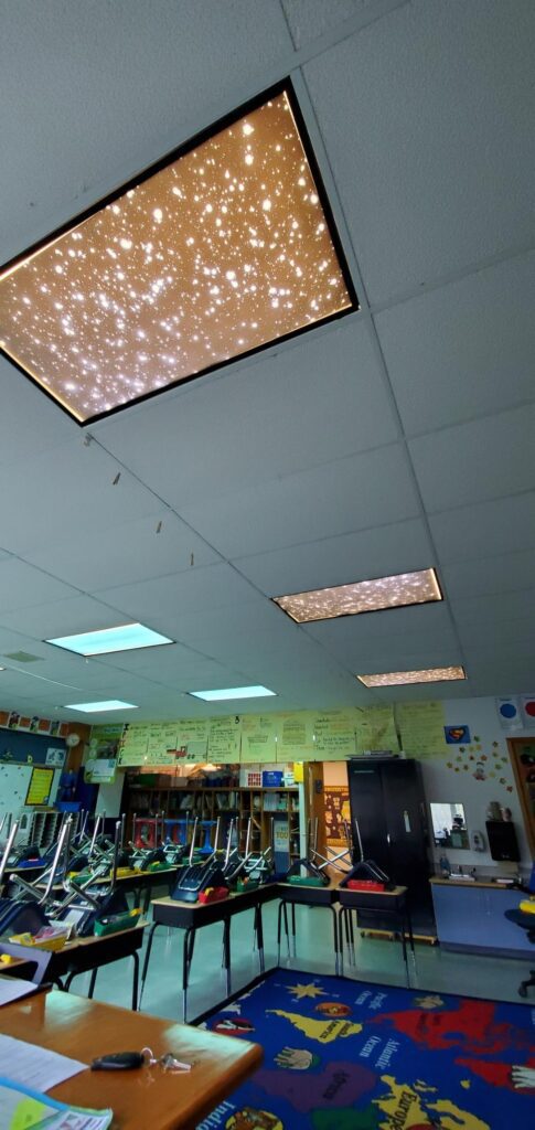 Classroom with fluorescent light covers with stars