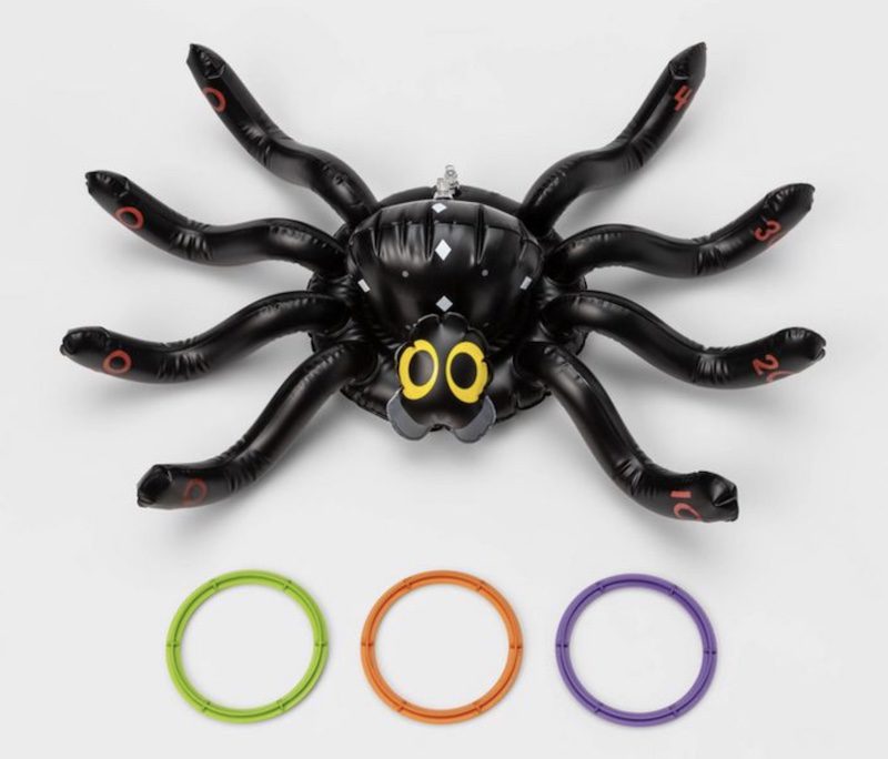Inflatable spider with rings to toss on legs, as an example of classroom decor for Halloween