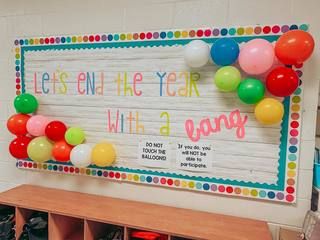 Welcome sign with balloons reading 