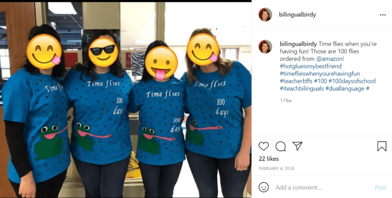 Four teachers with faces covered by emojis wearing matching blue shirts