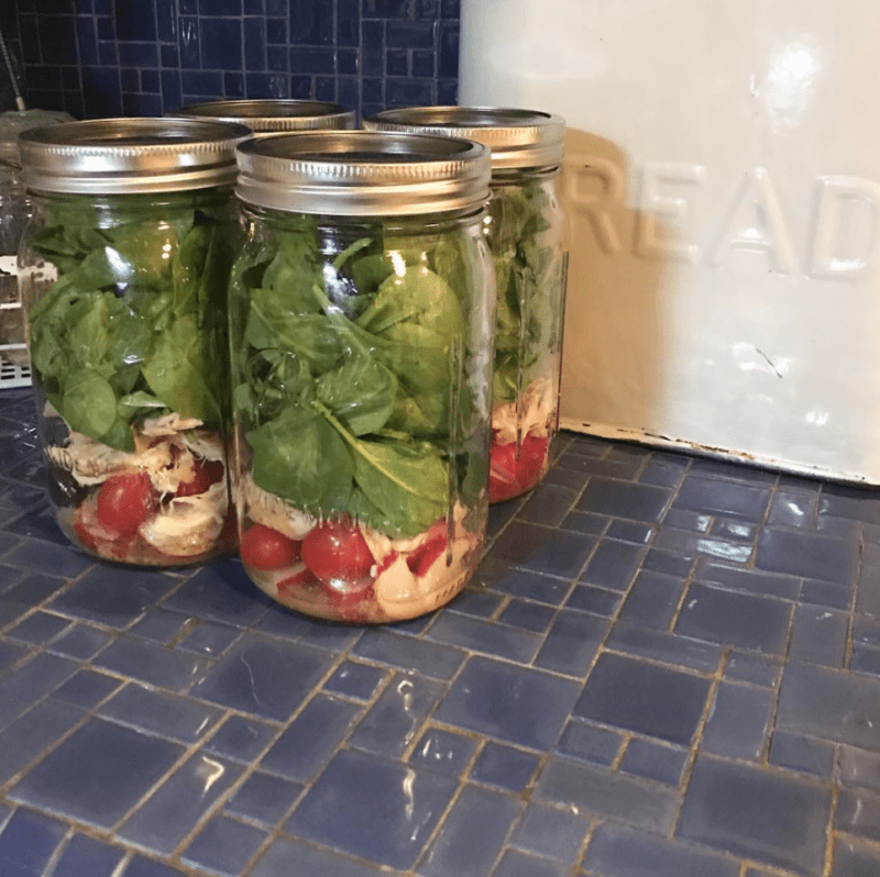 Salads in jars on a countertop