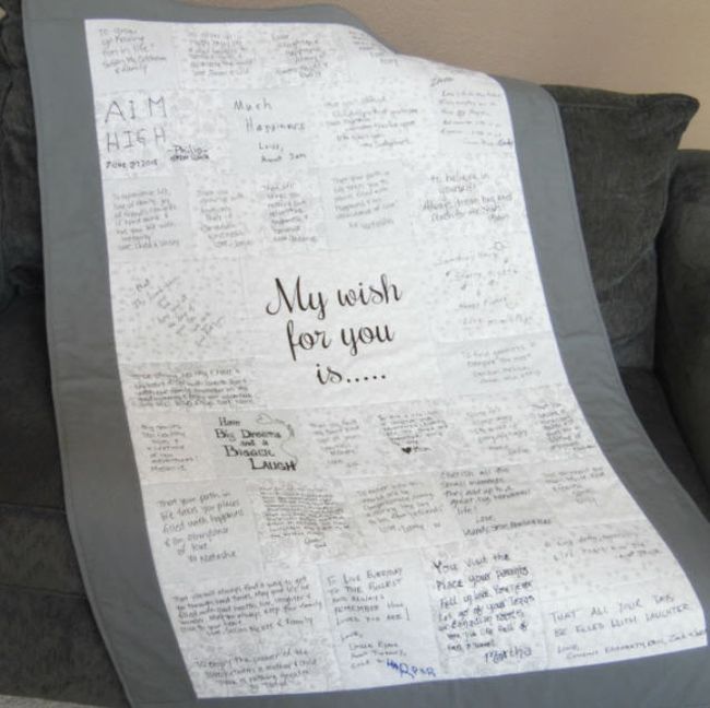 Gray-bordered quilt with autographs and messages on each square.  Center square reads "My wish for you is..." (Teacher Retirement Gifts)