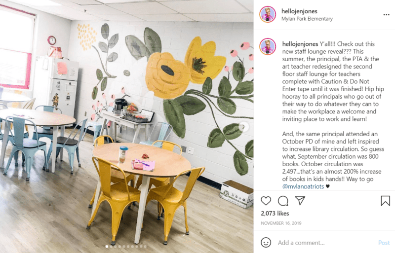 Cinderblock wall that has been painted with yellow flowers on it in a teachers lounge