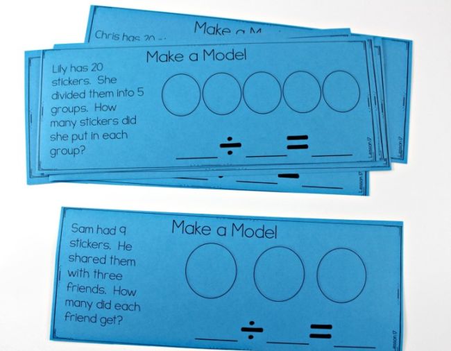 Division models using circles on blue slips of paper