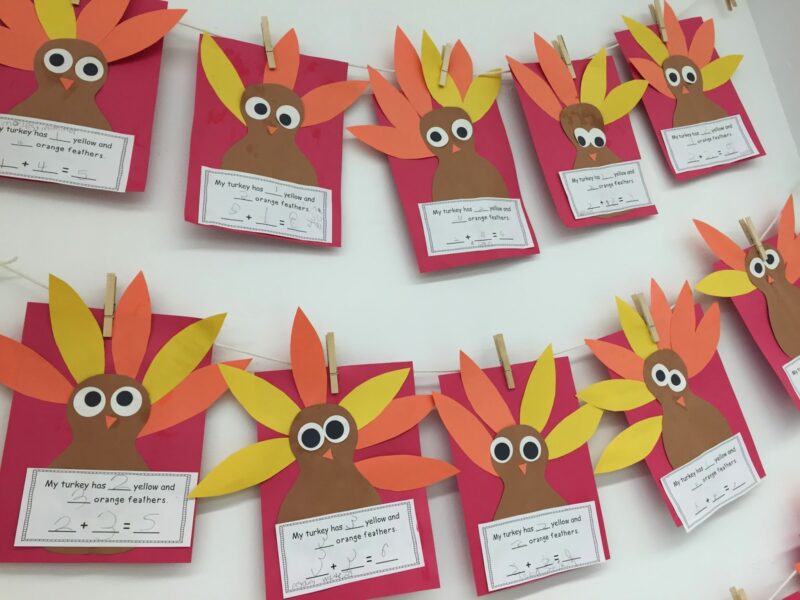 Fall bulletin boards can display art or student work like this one. Cute turkeys made by students have math problems on them and are hanging from clotheslines and clothespins.