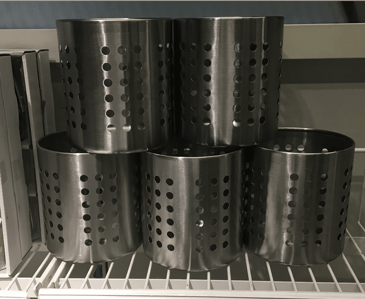 silver metal Utensil Holders stacked up 