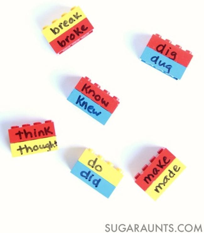 Lego bricks labeled with present and past tense of irregular verbs