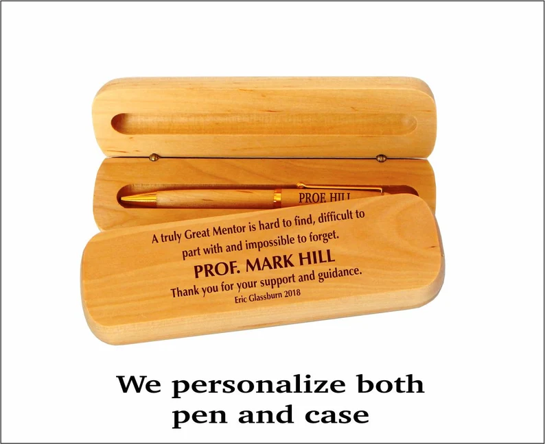 A wooden case has engraving on it and a nice pen is inside it (personalized teacher gifts)