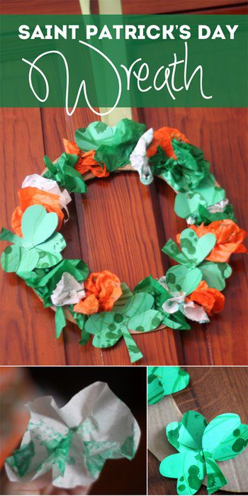 A wreath is constructed from orange, green, and white shamrocks.