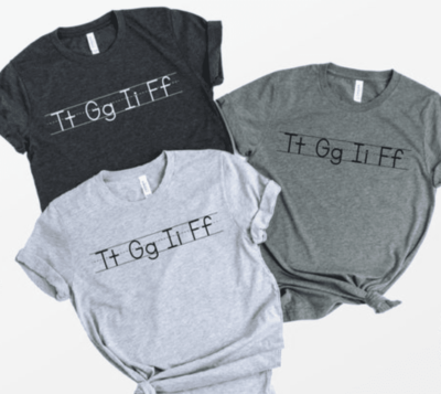 Writing the alphabet teacher shirt with letters on writing lines